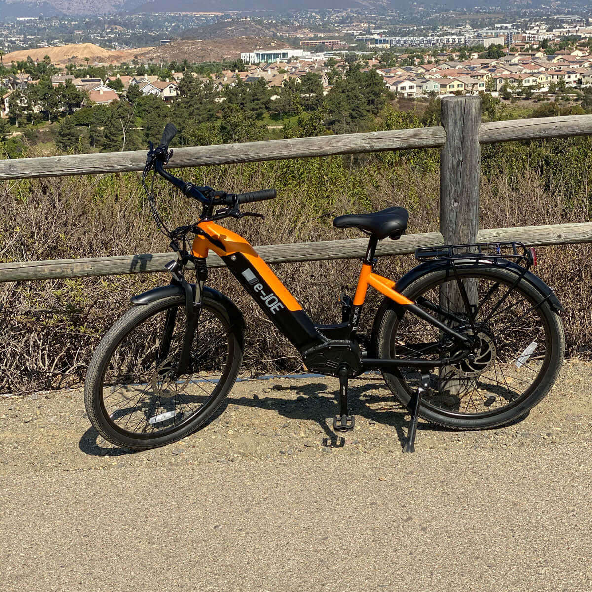 E-Joe Jade Beach Cruiser electric bike in an outdoor setting with a scenic view.