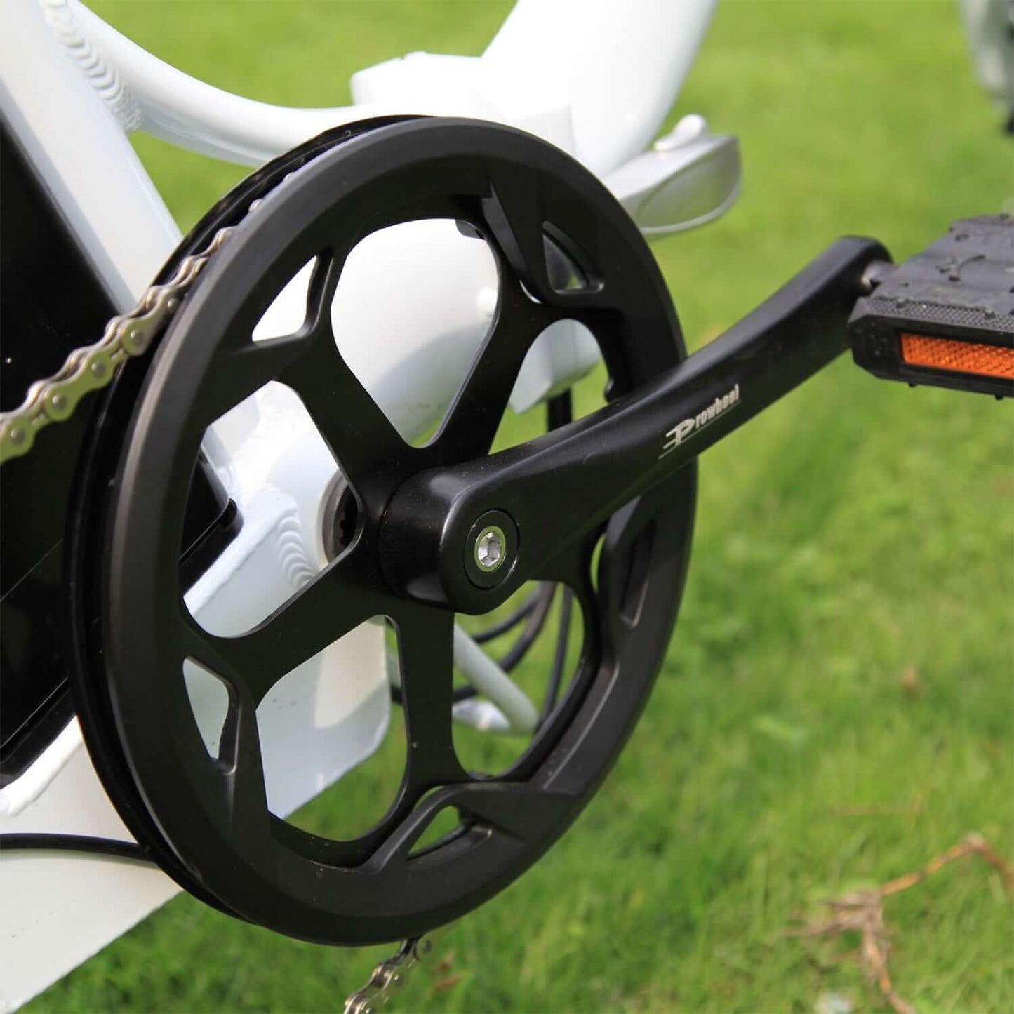 Close-up of the pedal and chain of the Drvetion CT20 Fat Tire Folding Electric Bike.