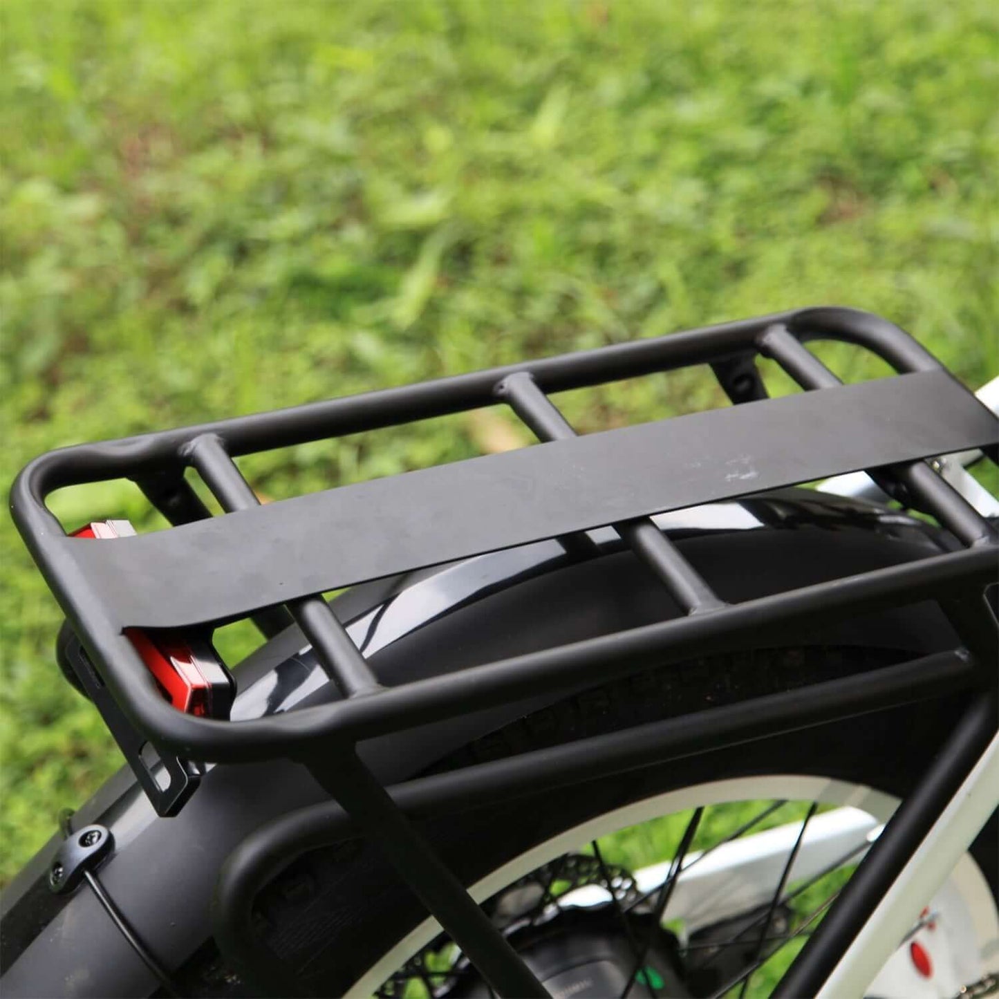 Drvetion CT20 fat tire folding electric bike rear rack showing sturdy design for cargo.