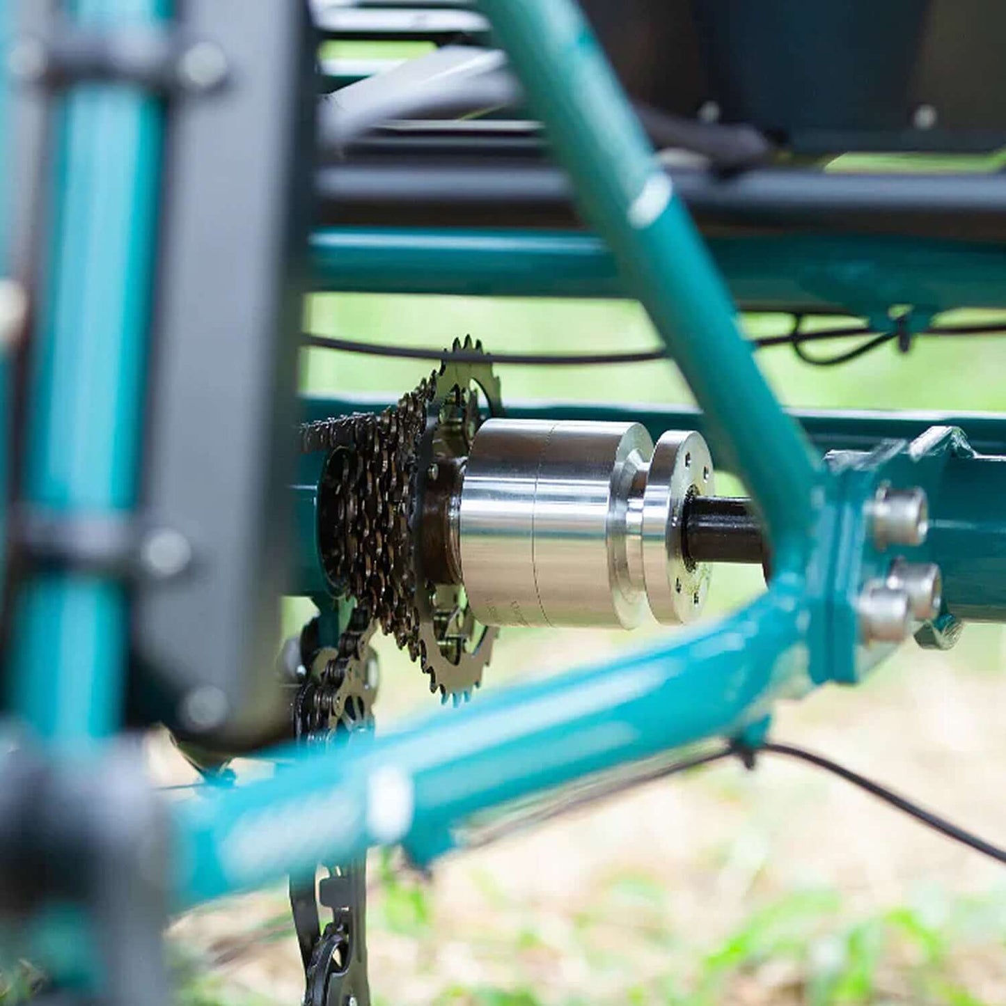 Close-up view of the gear mechanism on the Emojo Bison S Step-Thru Electric Trike, showcasing its functionality and design.