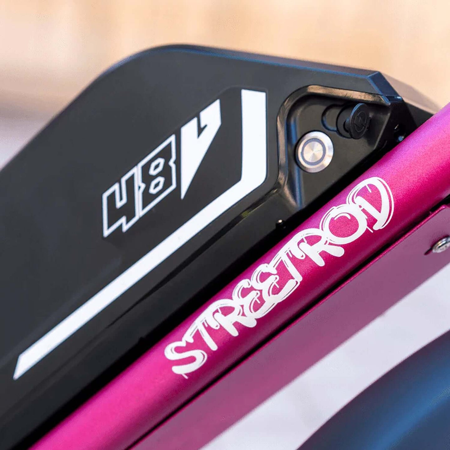 Close-up of Emojo Streetrod 48V electric bike frame showcasing the branding and design details.