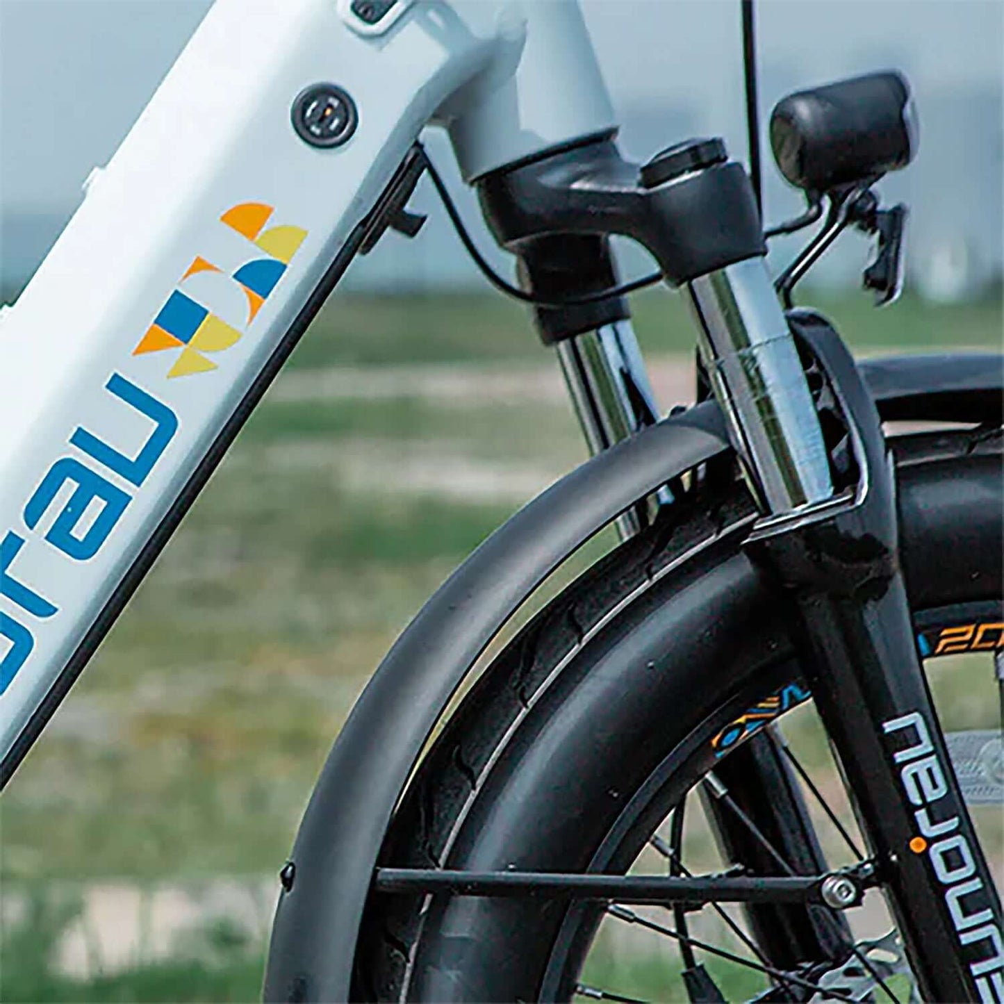 Eunorau META Foldable electric bike front fork and tire close-up detail.