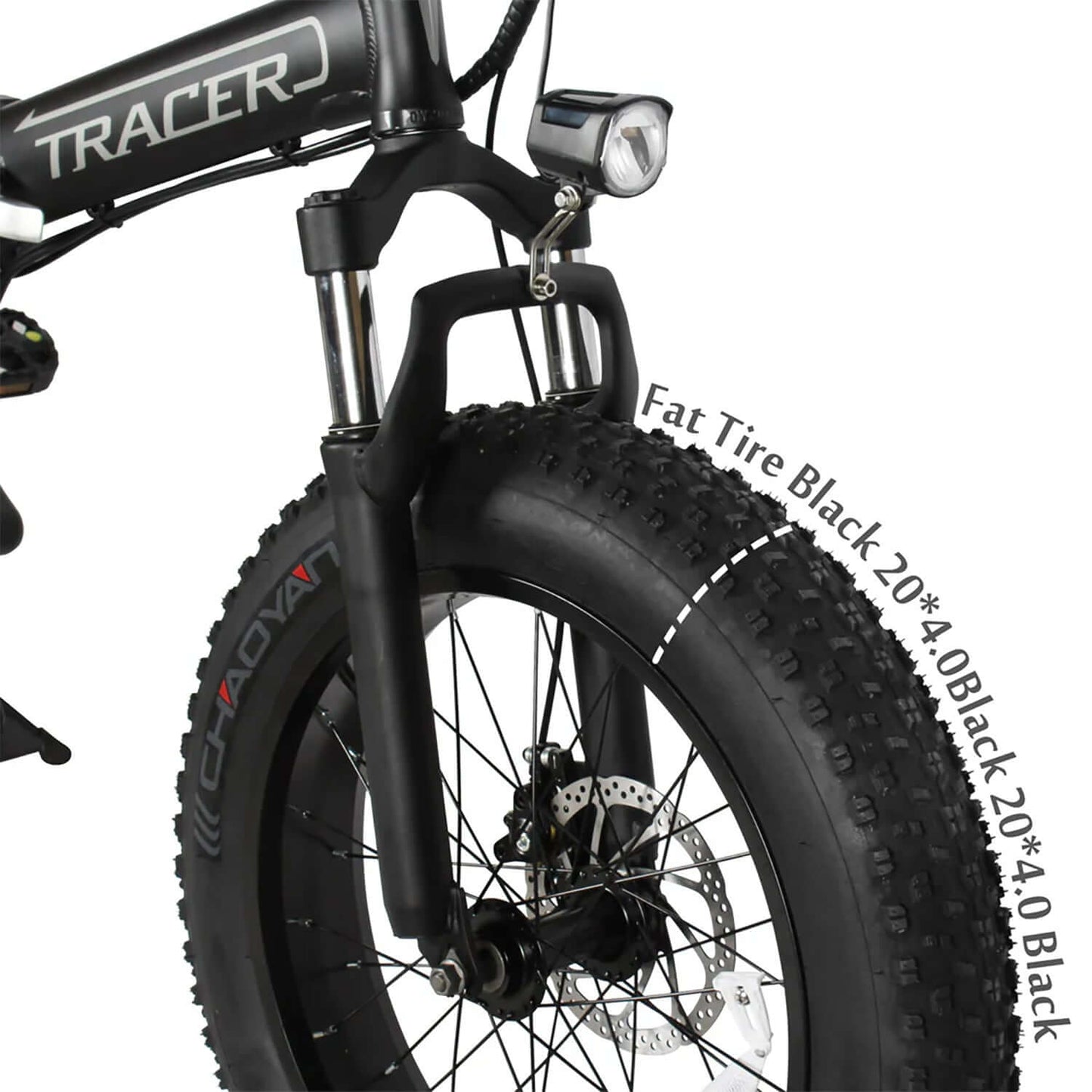 Close-up of Tracer Coyote foldable electric bike front fork with fat black tire and headlight.