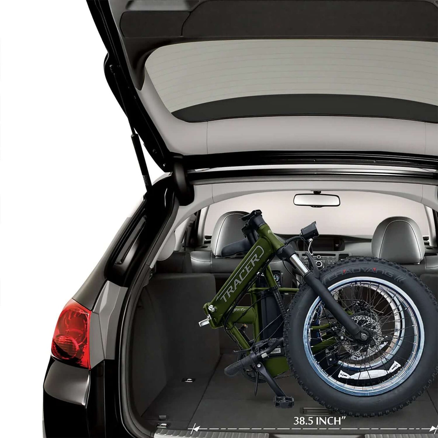 Foldable Tracer Coyote electric bike stored compactly in the trunk of a car.