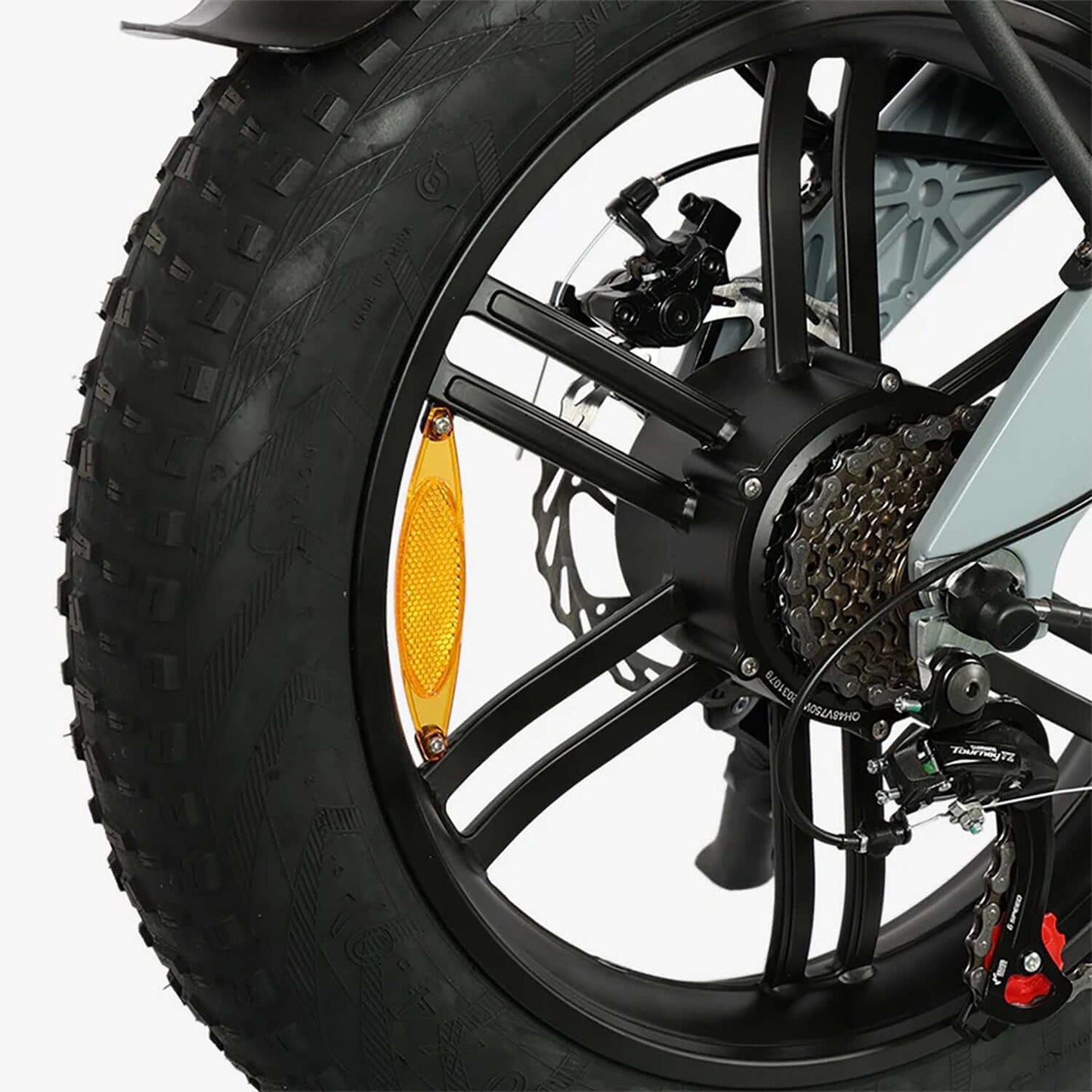 Close-up of the rear wheel of the Tracer Kama 2.0 folding electric bike showcasing thick tires and hub components.