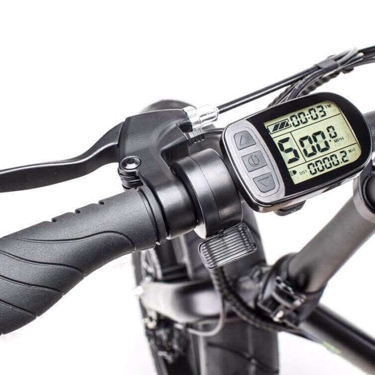 Close-up of Qualisports Beluga electric bike's display showing speed and battery levels.
