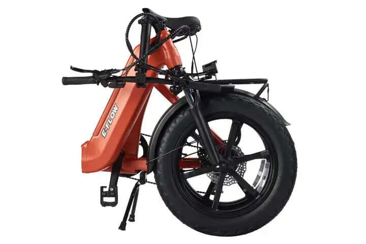 Orange electric bike with black wheels on a white background