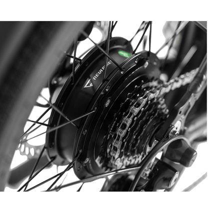 Close-up of a bicycle hub with visible brand name on a white background