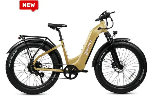 Beige electric bike with black details on a white background, featuring the brand 'Vespa'.