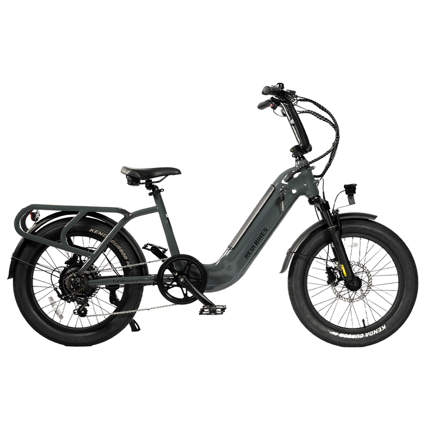A dark gray step-through electric bicycle with fat tires, rear cargo rack, front suspension, and integrated front light, shown on a plain white background.