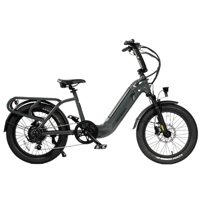 A dark gray step-through electric bicycle with fat tires, rear cargo rack, front suspension, and integrated front light, shown on a plain white background.